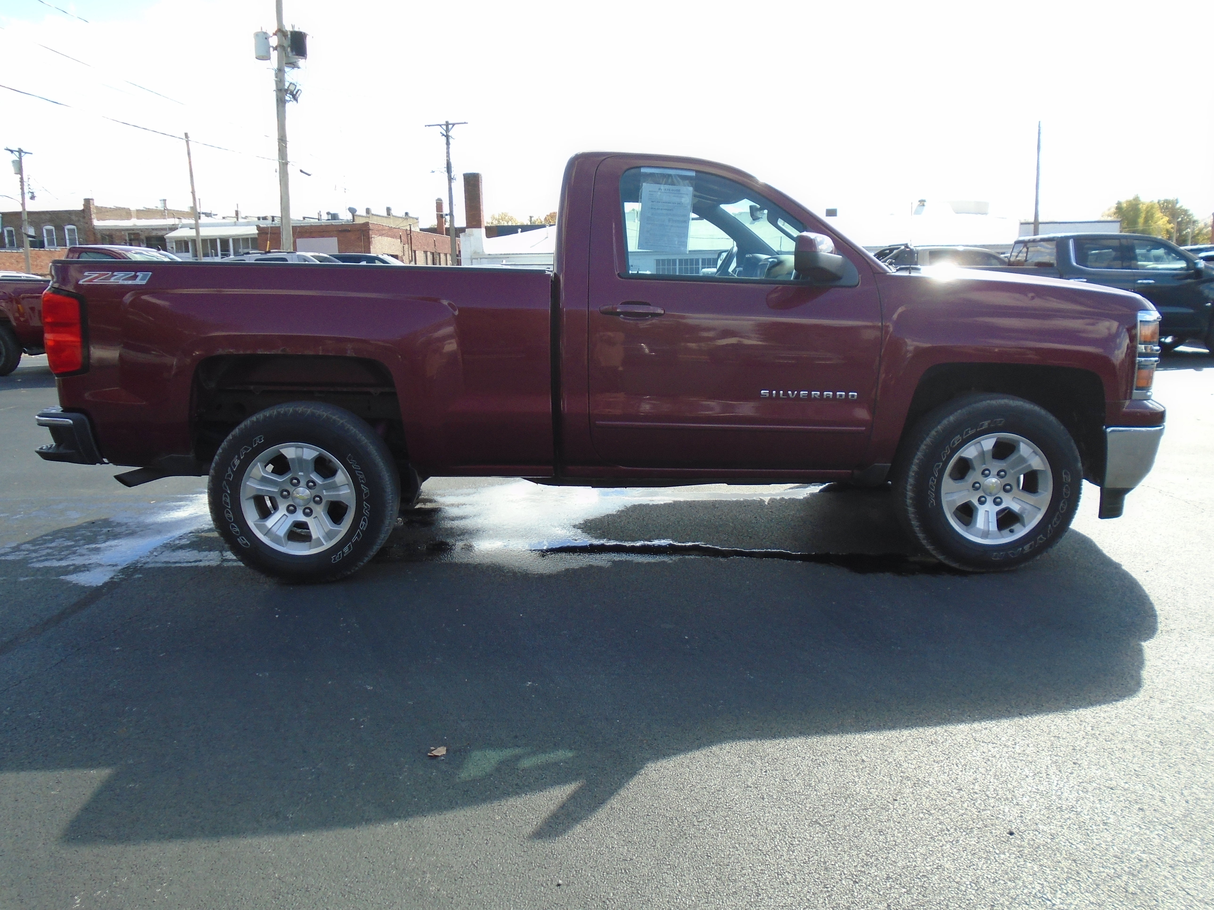 2015 Chevrolet Silverado 1500 LT in Deep Ruby Metallic — front three-quarter view