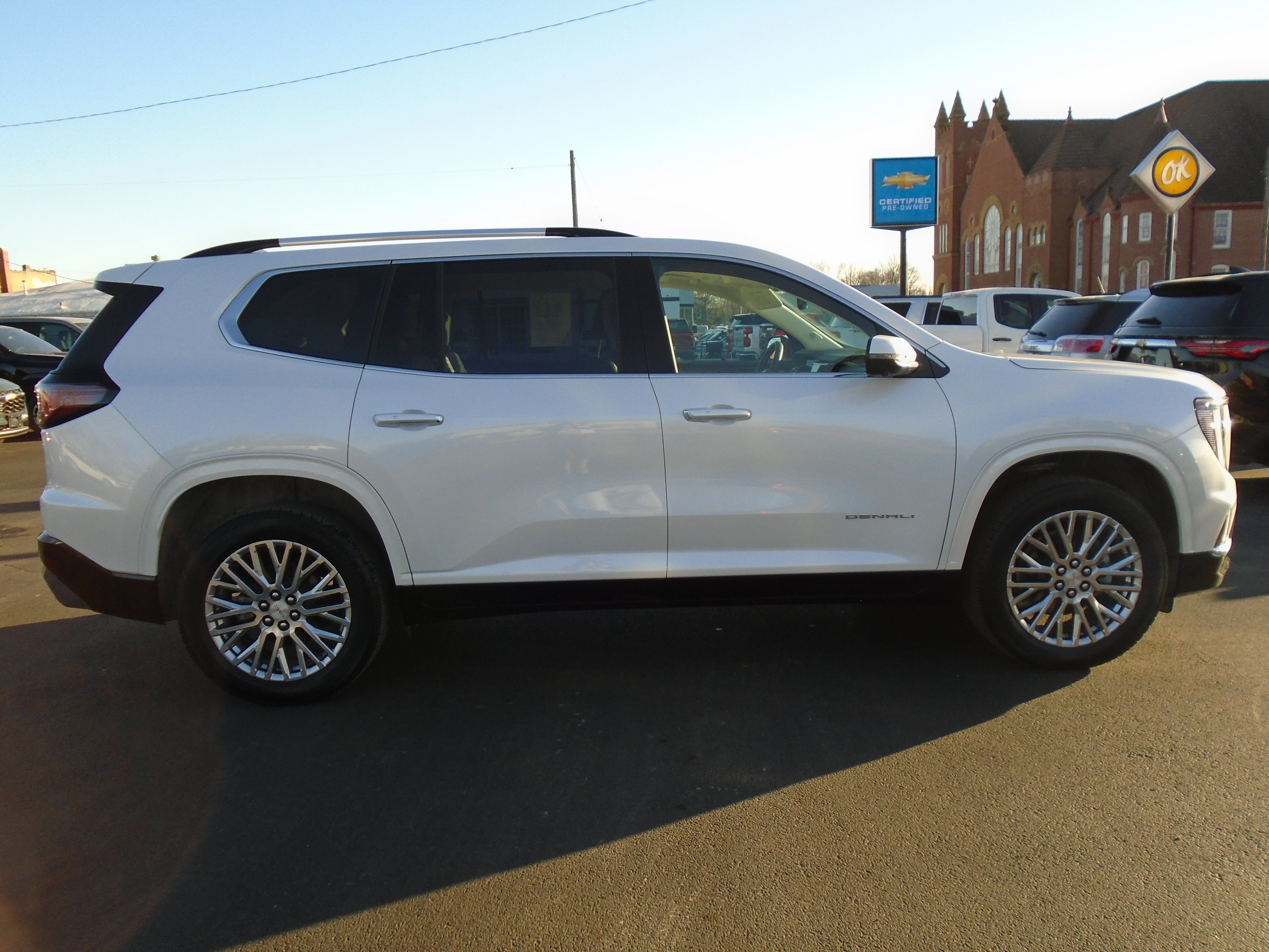 2024 GMC Acadia Denali in White Frost Tricoat — front three-quarter view