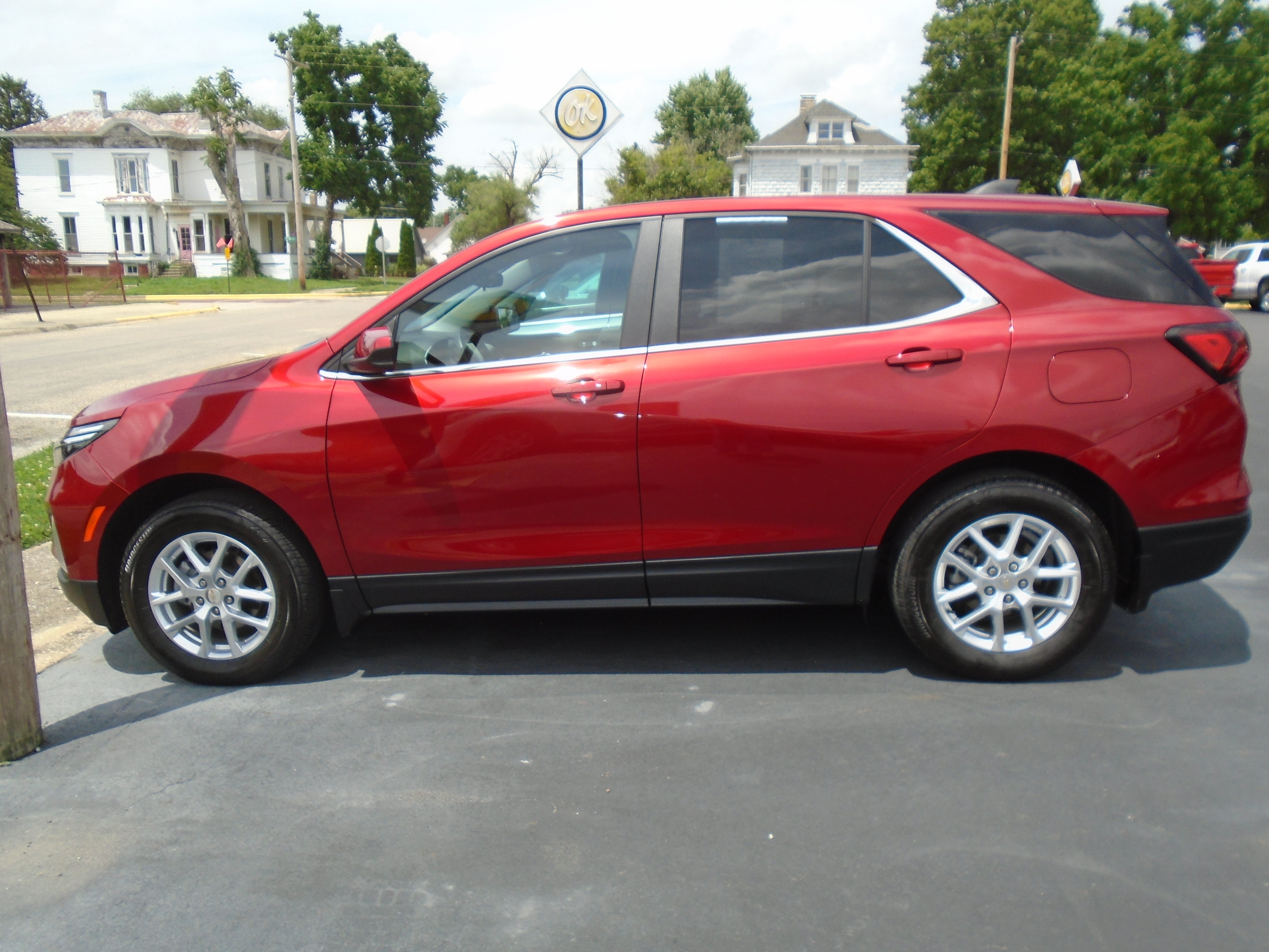 2024 Chevrolet Equinox LT in Radiant Red Tintcoat — front three-quarter view