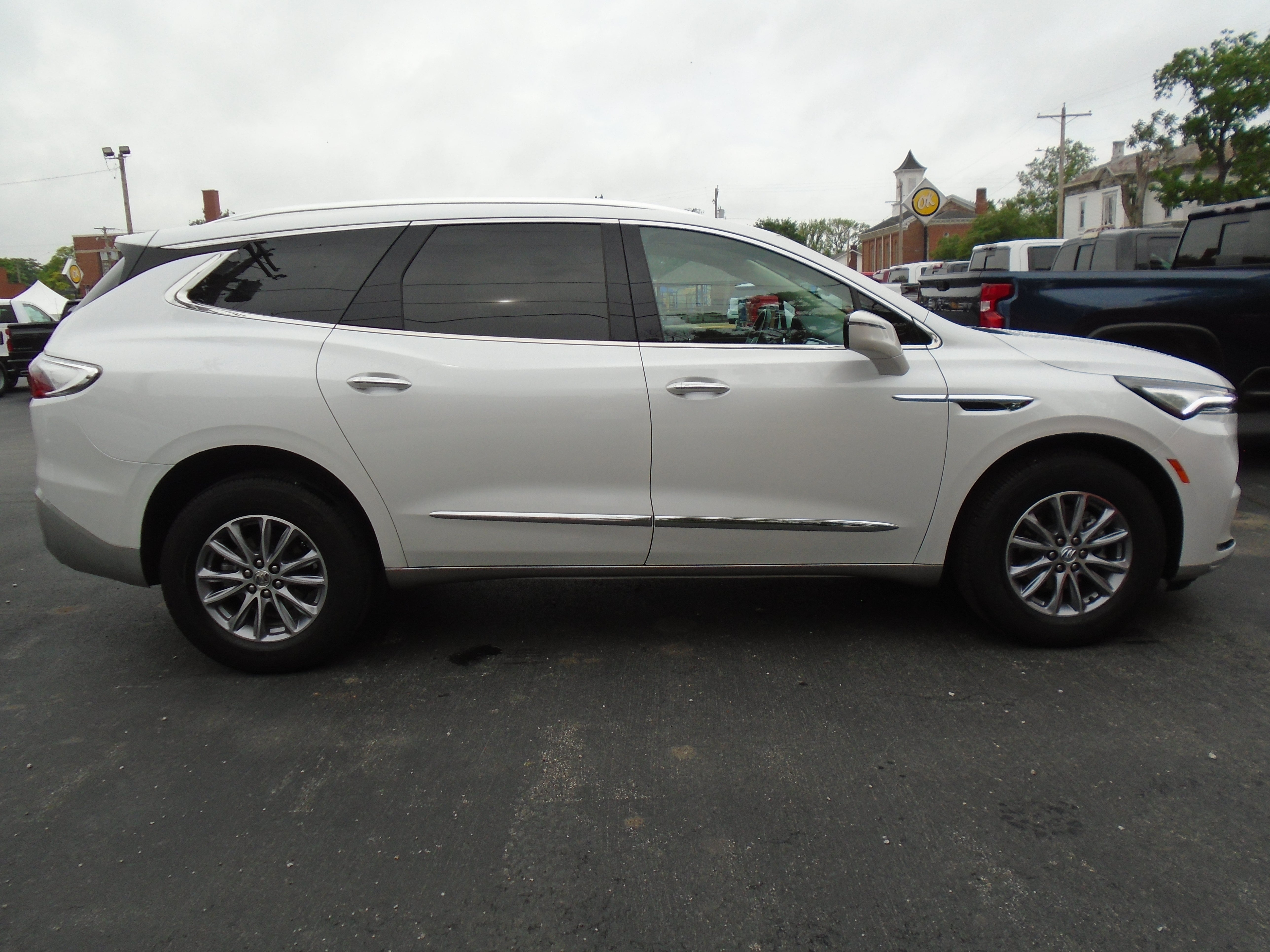 2024 Buick Enclave Essence in White Frost Tricoat — front three-quarter view